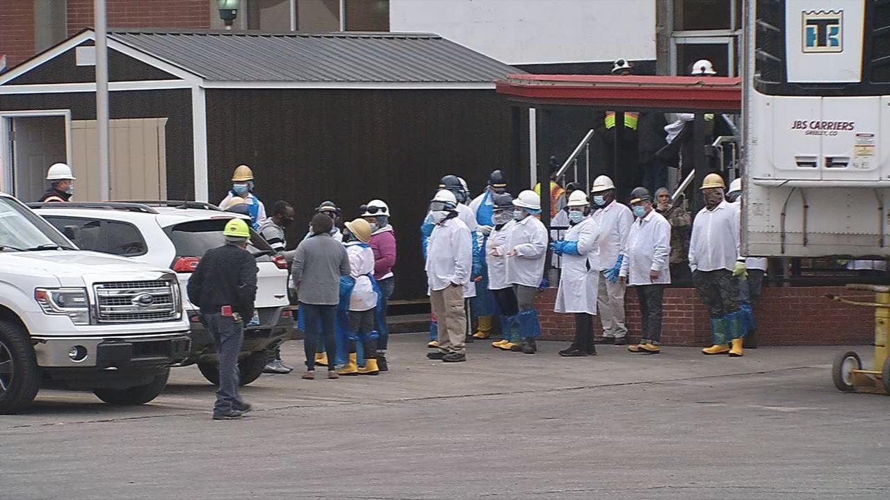Workers outside the JBS plant on Story Avenue in Butchertown